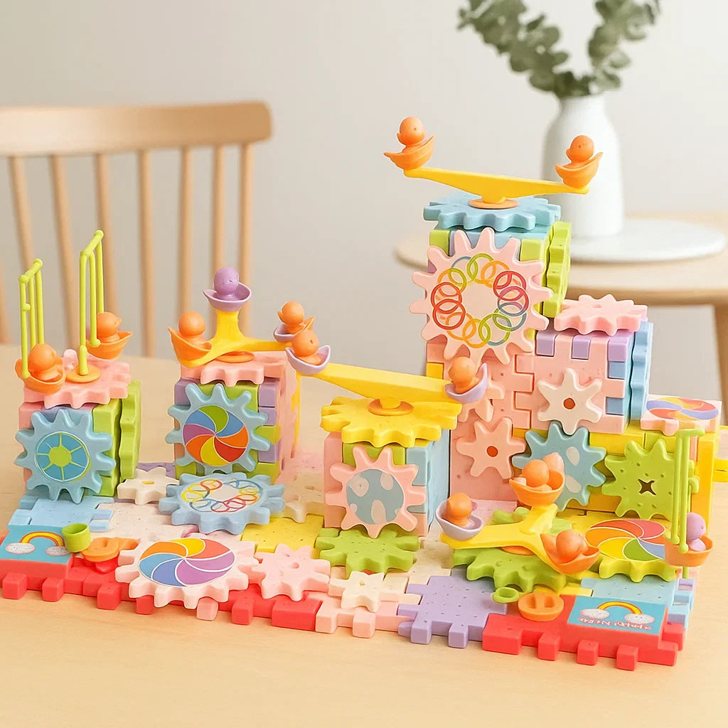 166-piece gear building set arranged with tall towers, connecting gears, and small rides.