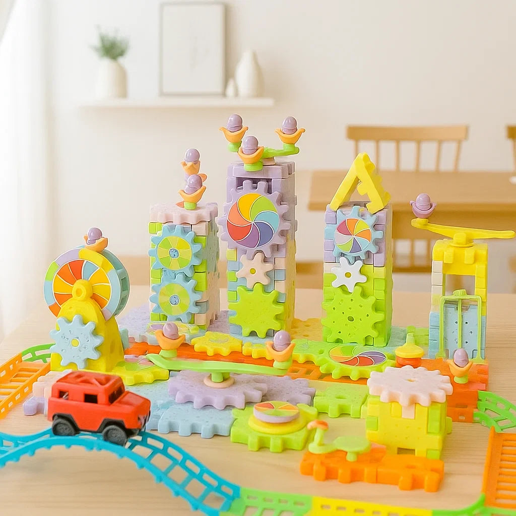 203-piece gear building set shown with tall towers, colorful gears, and an orange car on a curved track.