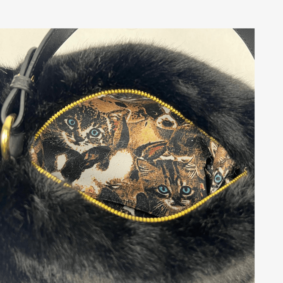 A realistic feline - inspired purse that makes a sensation everywhere (Black ) - | Zavonix