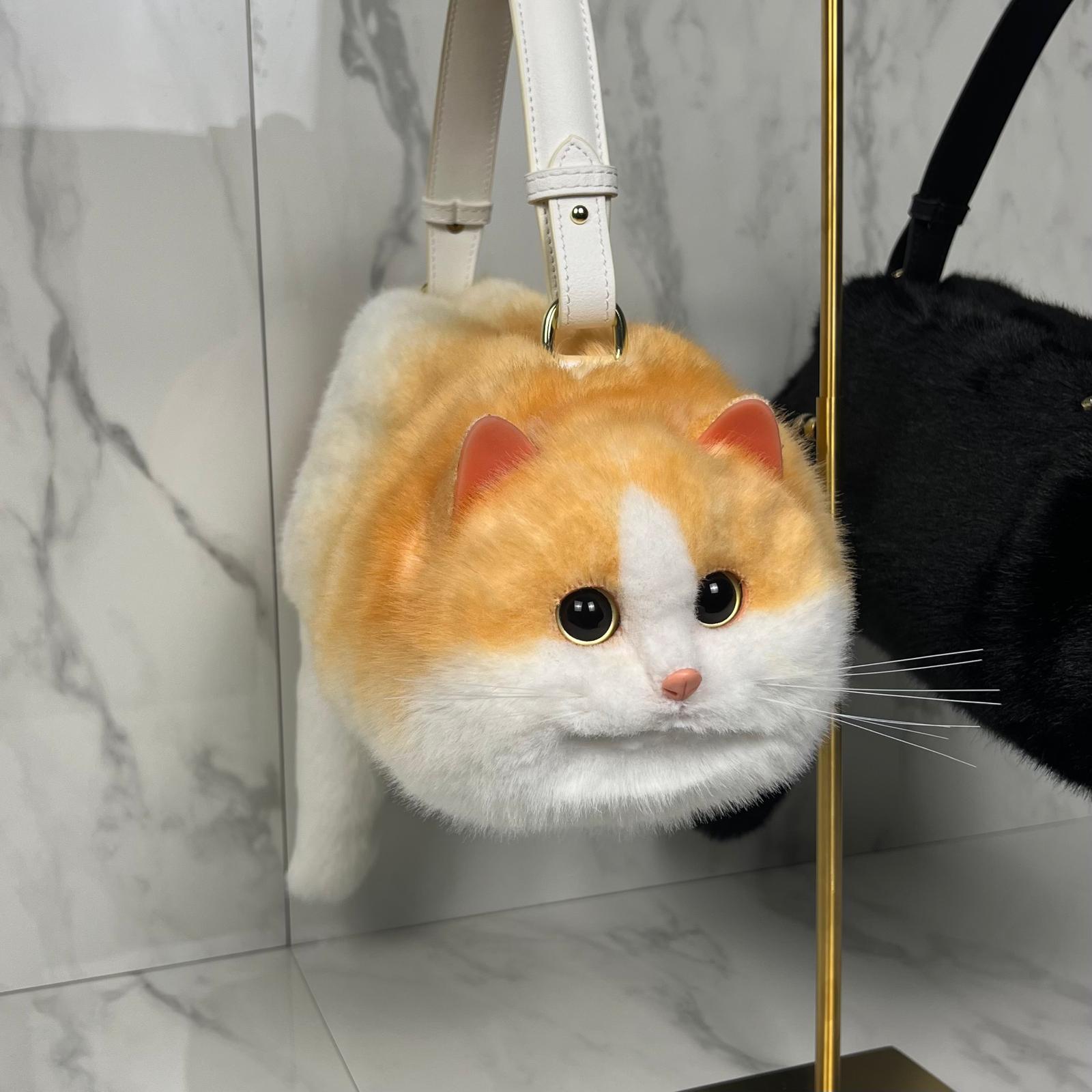 A realistic feline - inspired purse that makes a sensation everywhere (Orange and White ) - | Zavonix