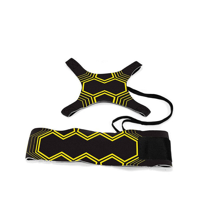 Adjustable black and yellow waist belt connected to a four-strap soccer ball holder