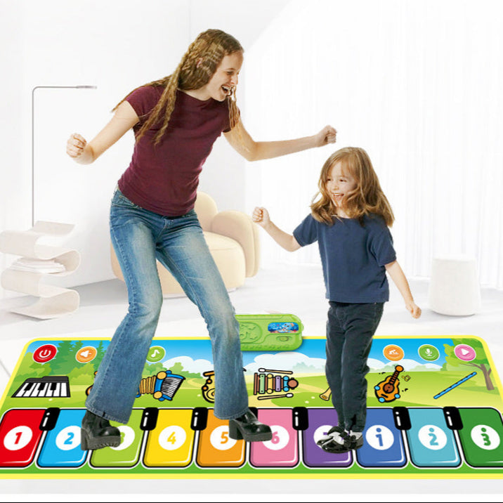 Adult and child stepping together on the colorful keys of a musical play mat