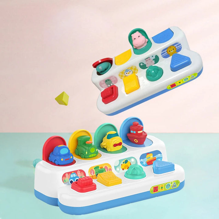 Animal and vehicle pop-up activity toys with red, yellow, green, and blue controls