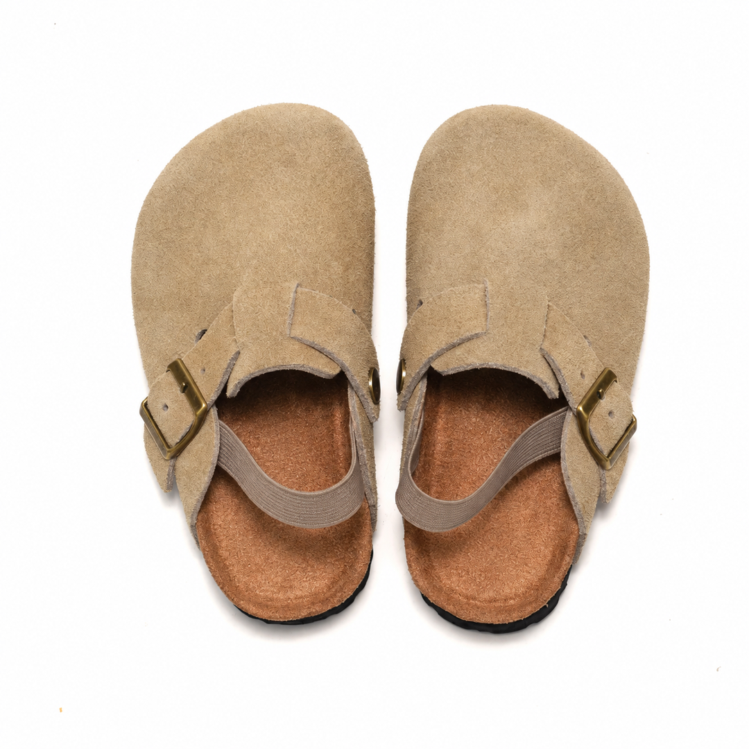 Top view of Apricot clog sandals showing closed toes, footbeds, buckles, and heel straps