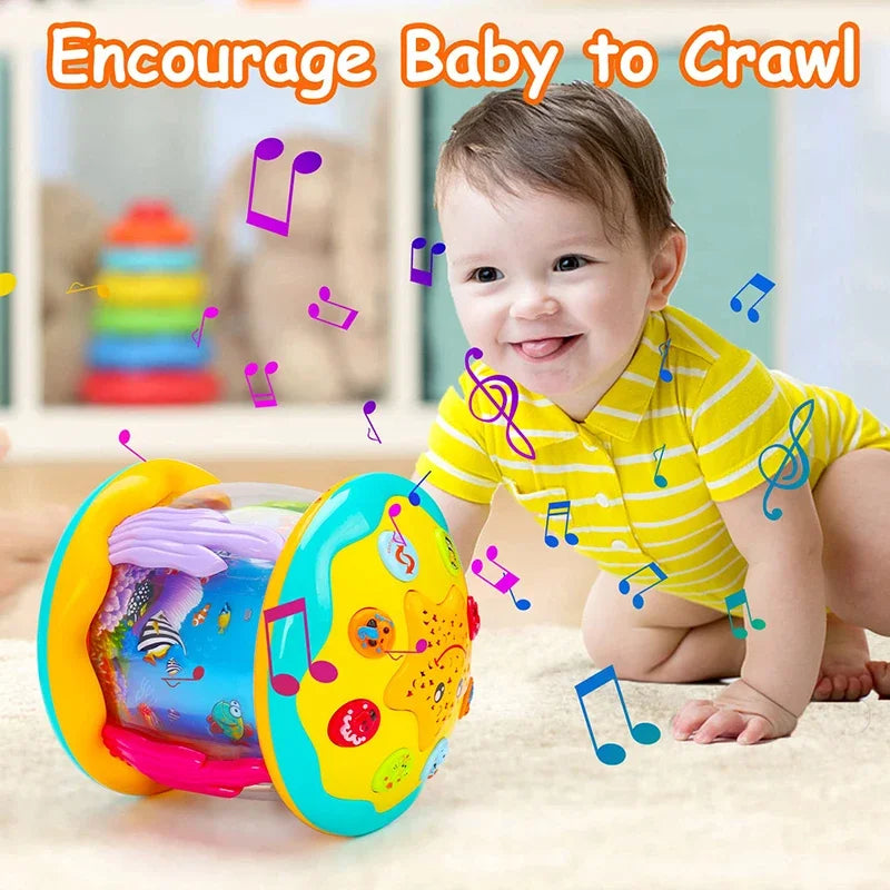 Baby reaching toward an aquarium musical toy resting on its side during floor play