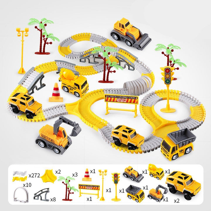 Assembled yellow and gray race track set with toy vehicles and an illustrated parts lineup