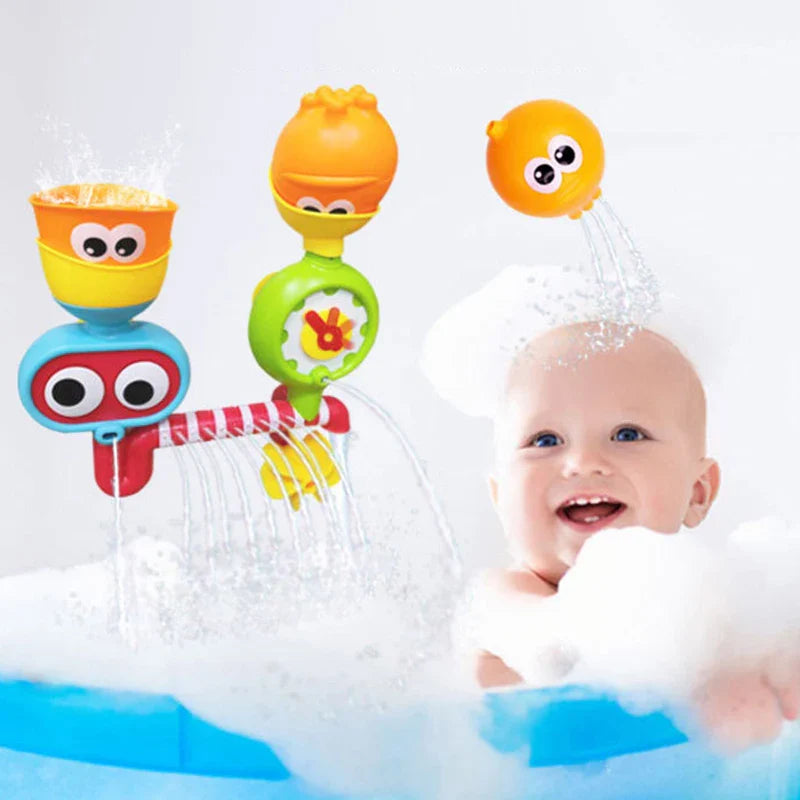 Baby in a bubble bath beside a colorful waterwheel toy and an orange pouring cup
