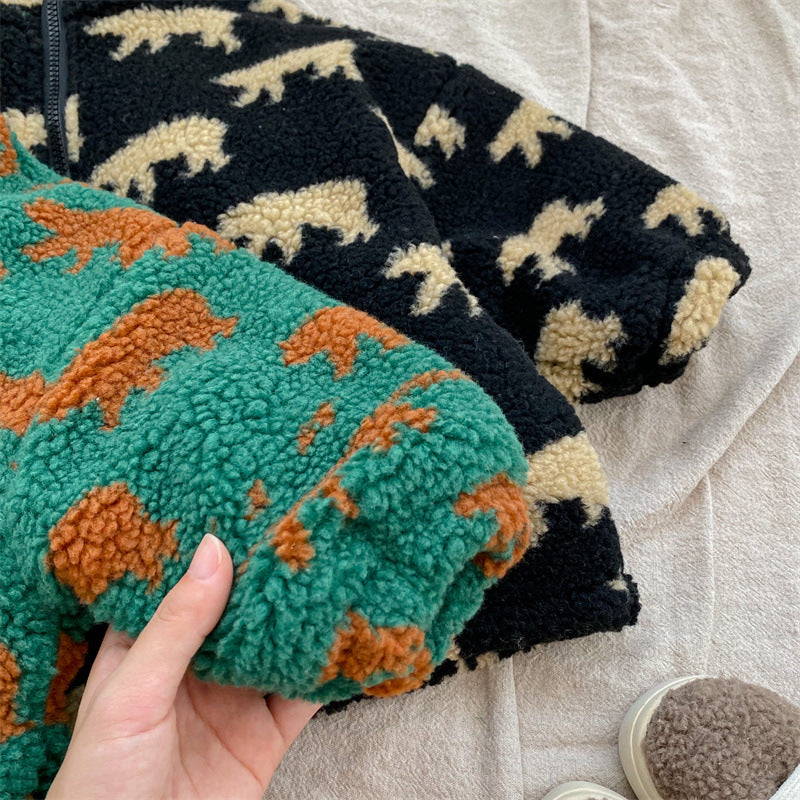 Close-up of green and black bear-print fleece jacket sleeves