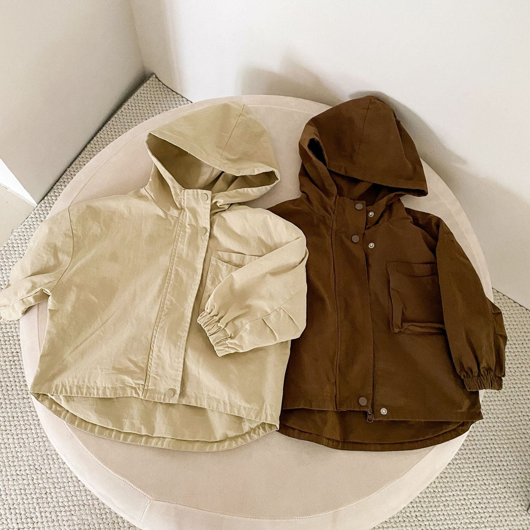 Beige and brown hooded parkas shown side by side with zip-and-snap fronts
