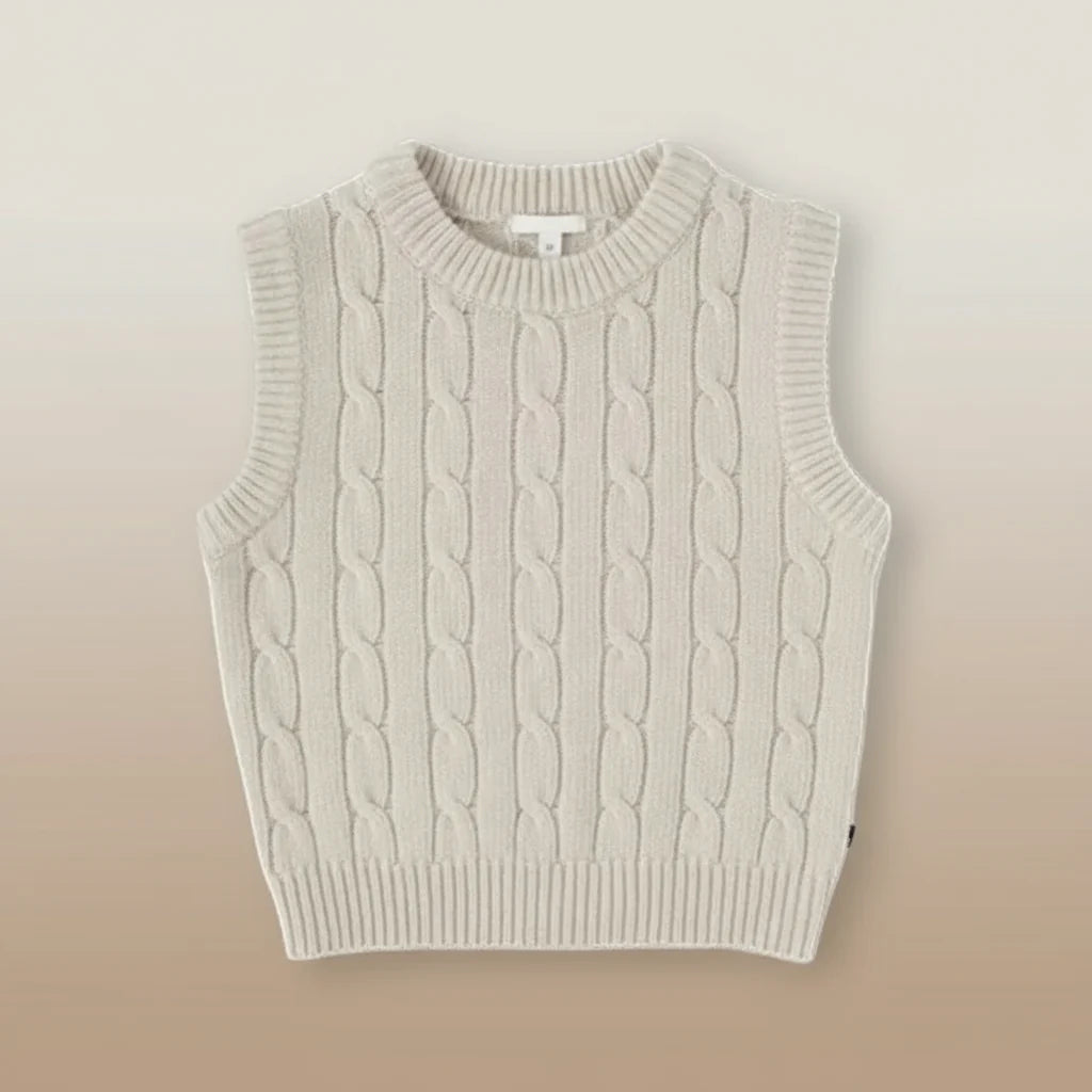 Front view of a beige sleeveless cable-knit vest