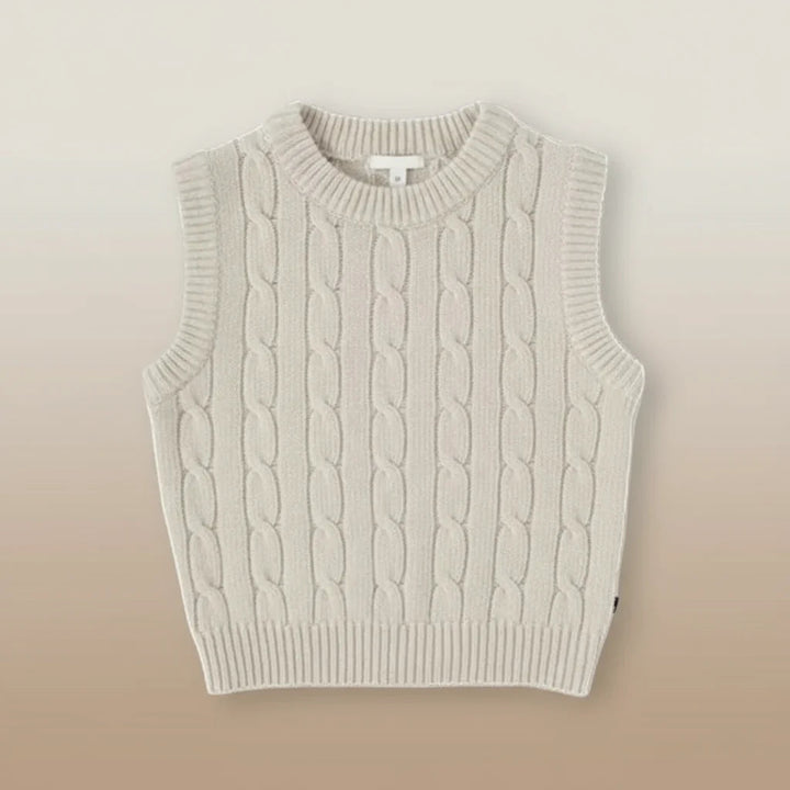Front view of a beige sleeveless cable-knit vest