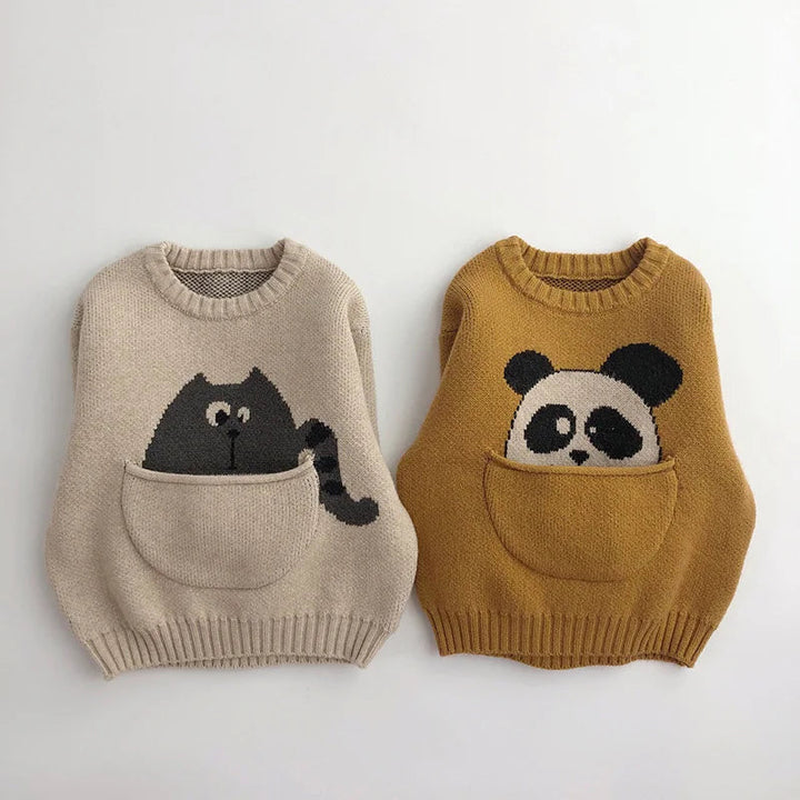 Beige cat and yellow panda sweaters folded to show animal motifs and front pouches