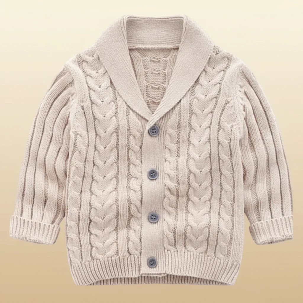 Beige cable-knit baby cardigan with a V-neck collar and gray buttons
