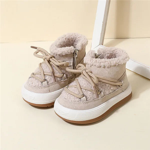 Beige winter boot color option with front laces and white soles over brown bases