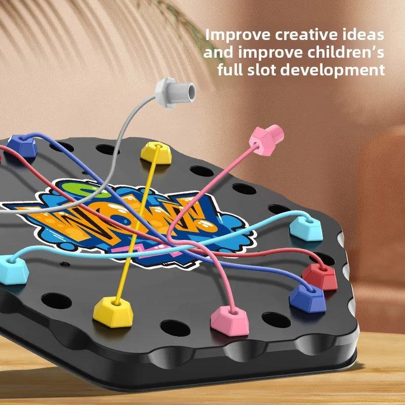 Close-up of lifted rope connectors and colorful elastic cords on a black puzzle board.