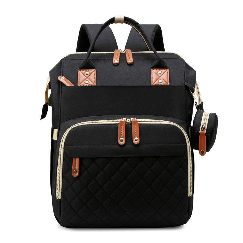 Black diaper backpack with top handles and zippered front compartments