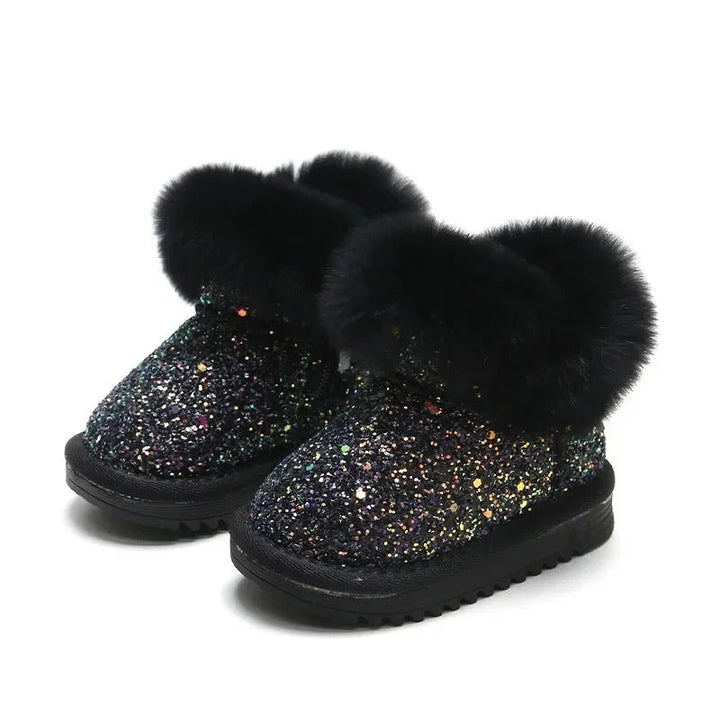 Black glitter winter boots with fluffy black cuffs and ridged soles.