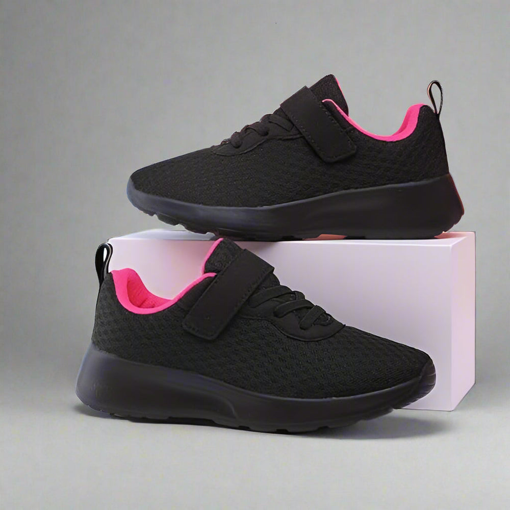 Black kids' sneakers with pink lining, black soles, and heel pull tabs