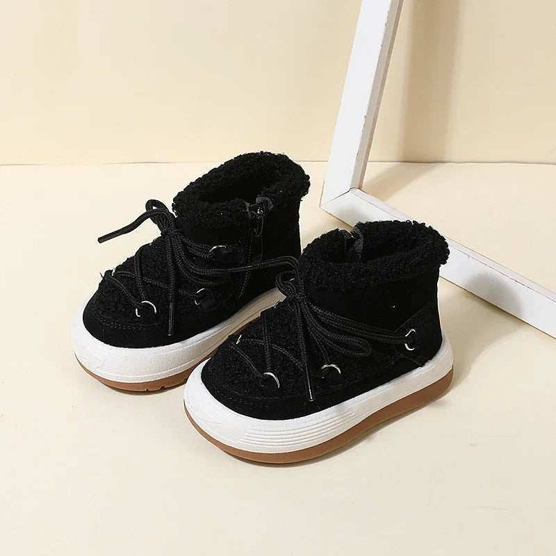 Black winter boots with faux fur collars and lace-up fronts