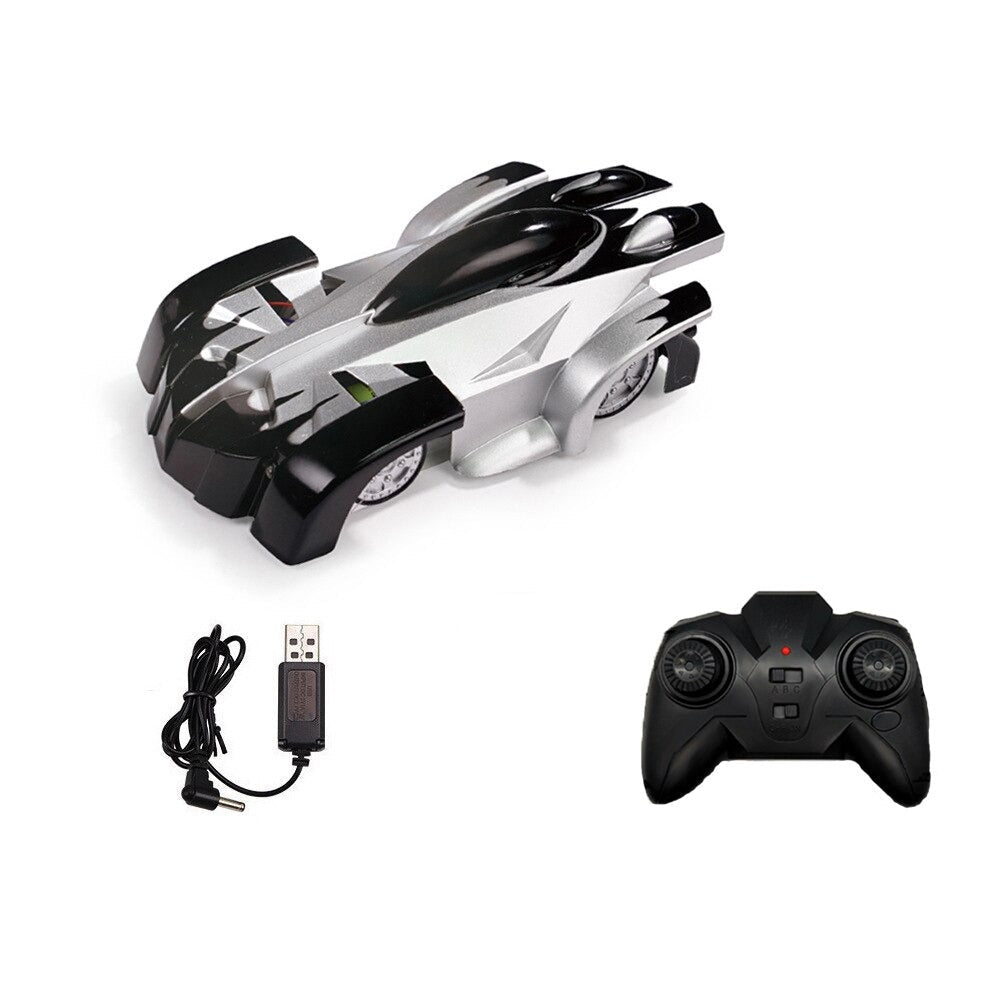 Black-and-silver remote-control car with its black controller and USB charging cable