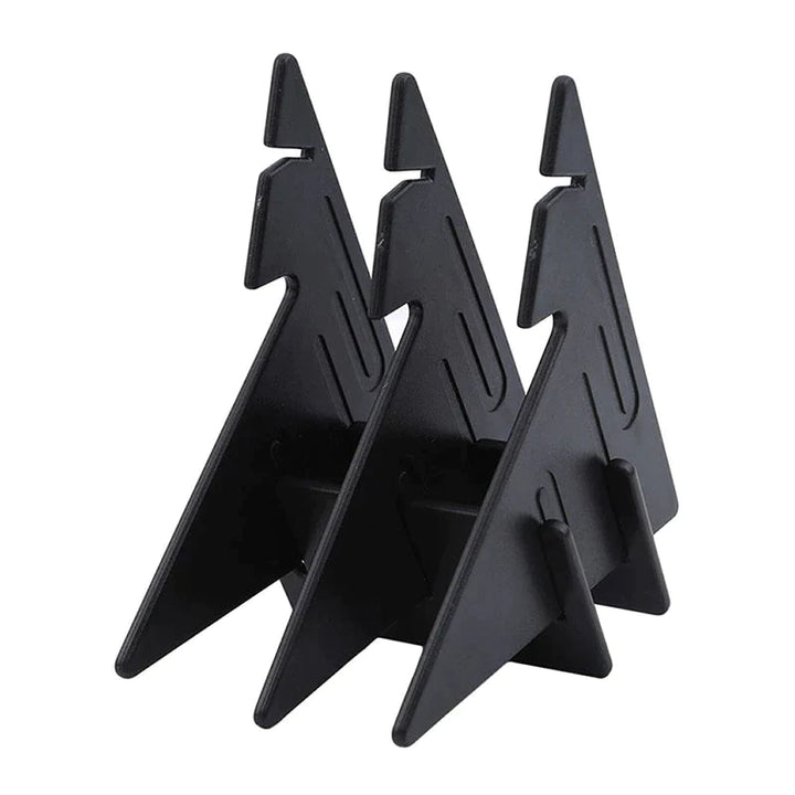 Three black slotted supports for the drawing projector