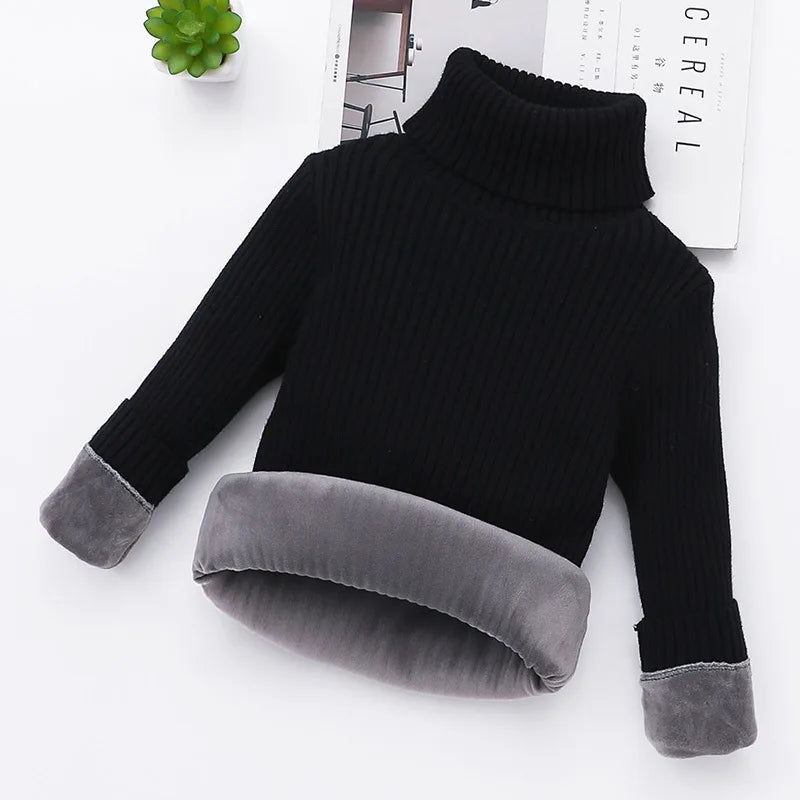 Black ribbed turtleneck sweater with gray plush lining at the hem and cuffs