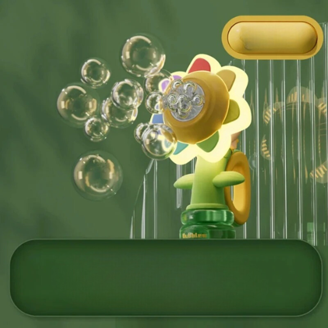 Yellow flower bubble blower with multicolored petals and bubbles against a green background