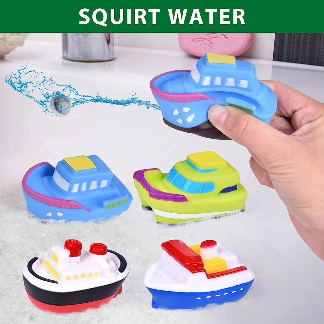 A blue bath boat squirts water beside other colorful toy boats