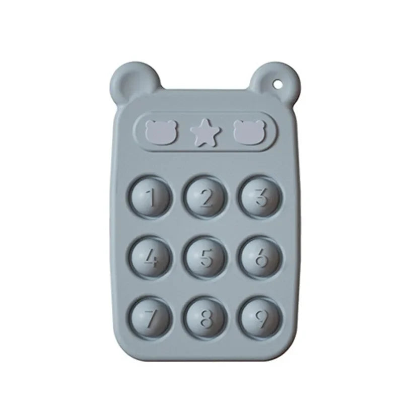 Blue silicone teething phone with nine numbered buttons and bear-ear corners
