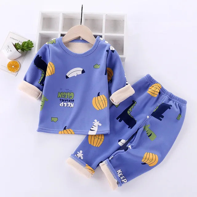 Blue fleece pajama set with bear and fruit prints, an elastic waist, and cream cuffs