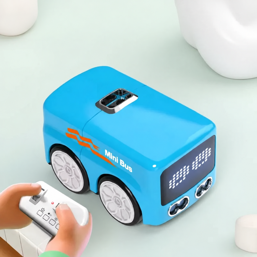 Blue mini remote control bus being steered with a handheld controller