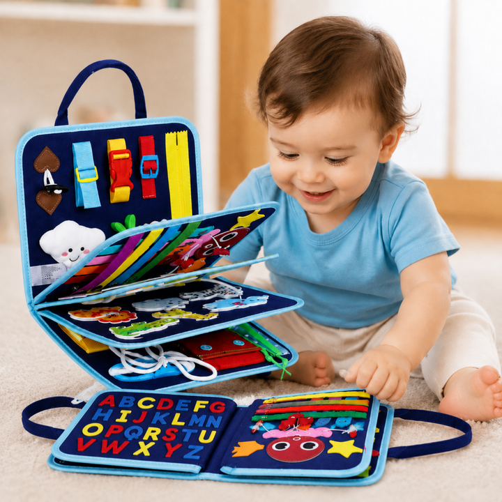 Child exploring the blue busy board with open felt activity pages.