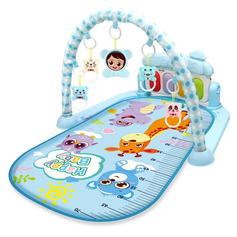 Blue cartoon animal play mat beneath a dotted toy arch with hanging animal toys