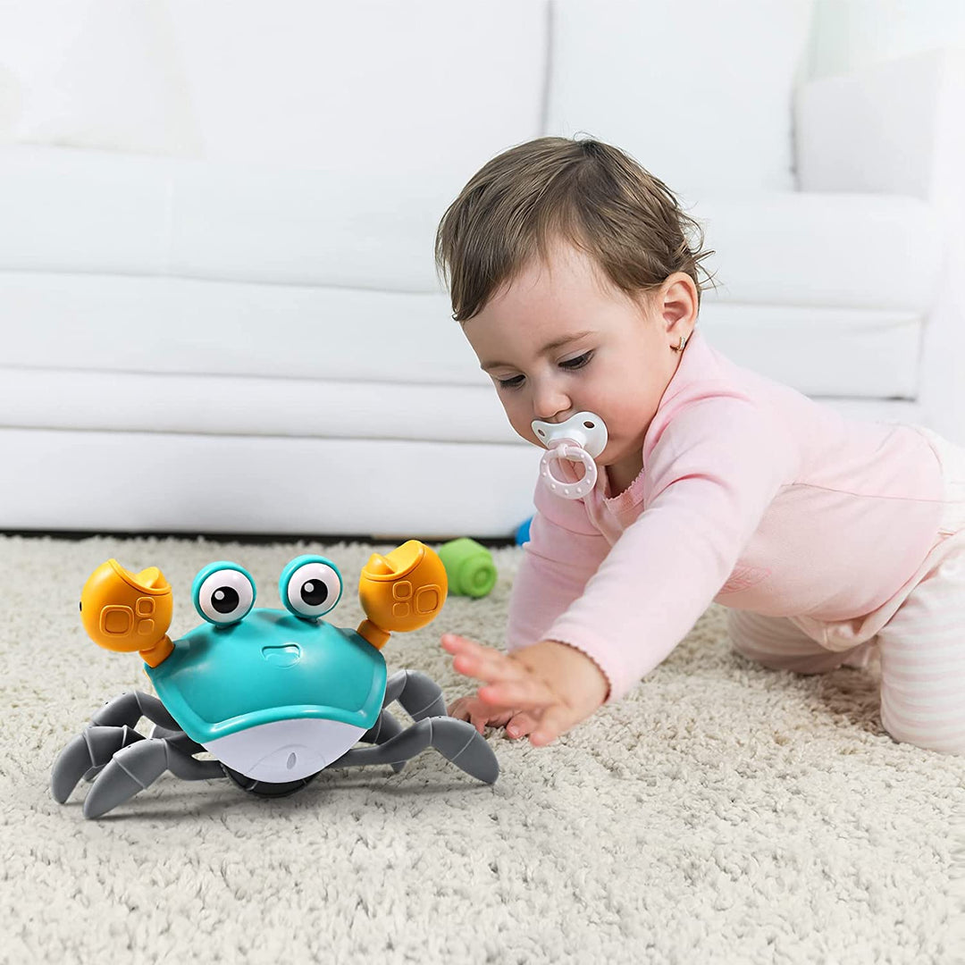 Child reaching toward a blue crawling crab toy on a carpet