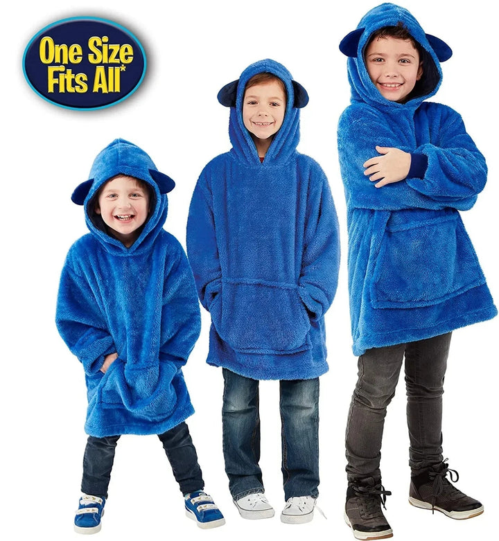Three children of different heights wearing the roomy blue creature hoodie.