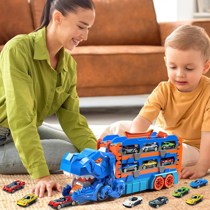 An adult and child play with a blue dinosaur transport truck and small racing cars.