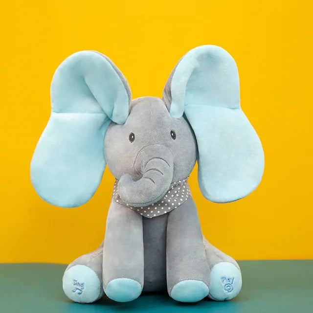 Gray elephant plush with blue ears and feet and a gray polka-dot bandana