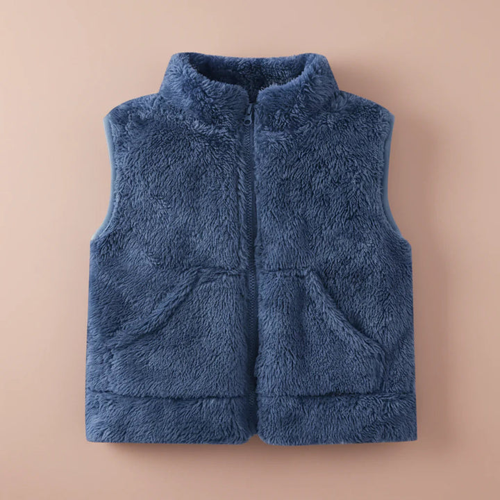 Front view of the blue fleece vest with a zip closure and two pockets