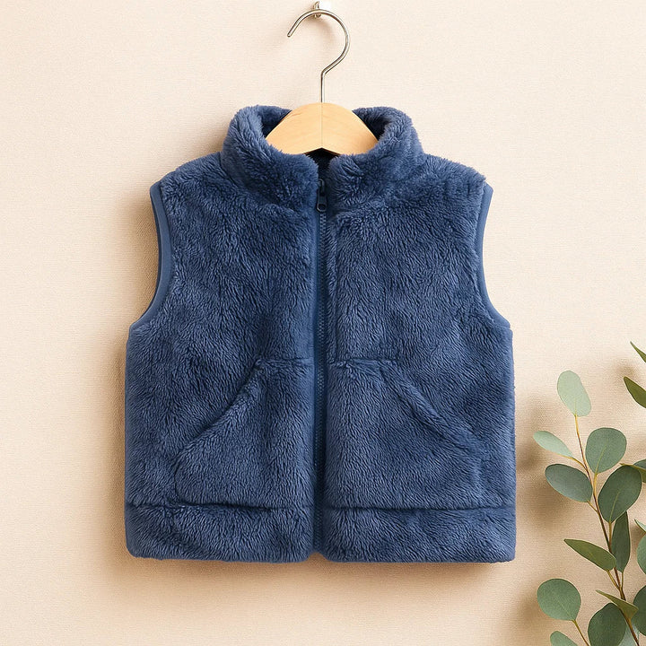 Blue fleece vest on a wooden hanger, showing the stand-up collar, zipper, and front pockets