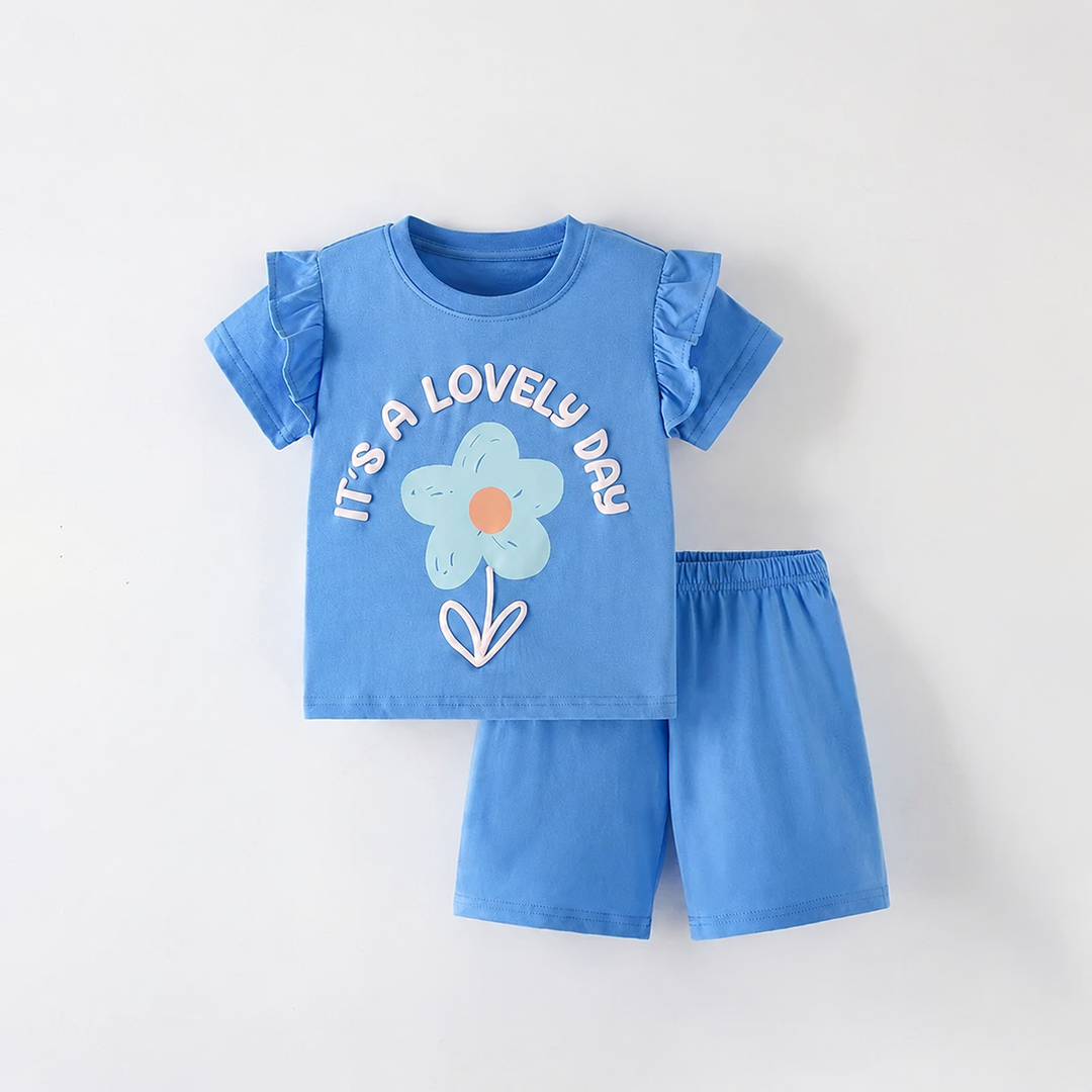 Blue flower-graphic top with ruffled sleeves and solid blue shorts