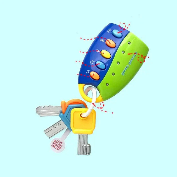Blue-and-green baby key toy with colorful buttons and toy keys on a ring