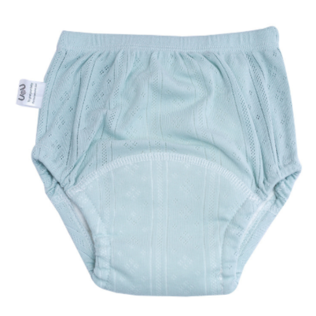 Pale blue-green cotton training pants with a gathered waistband and rounded front panel.