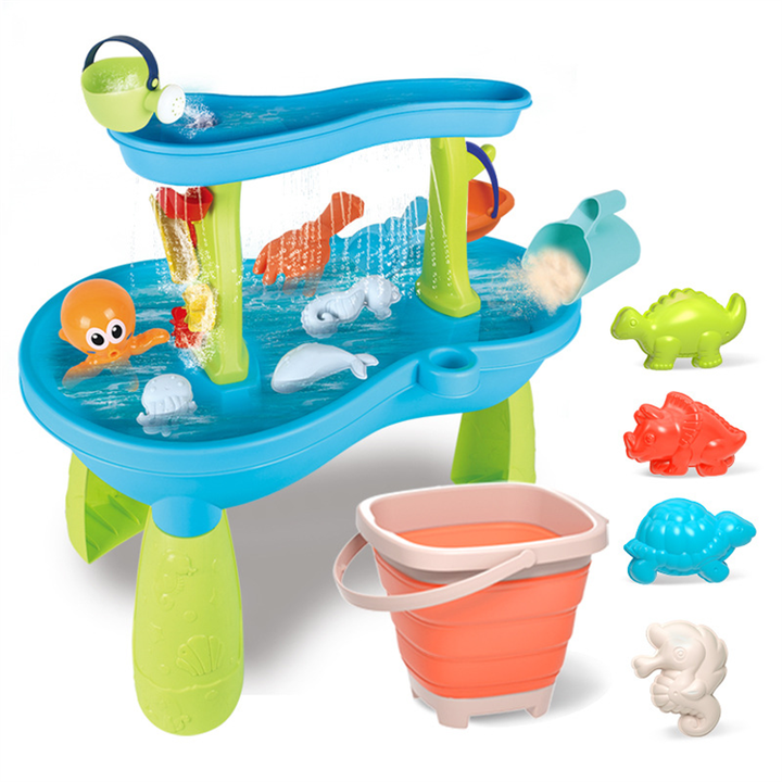 Blue and green two-tier water table with a bucket, watering can, and animal-shaped accessories