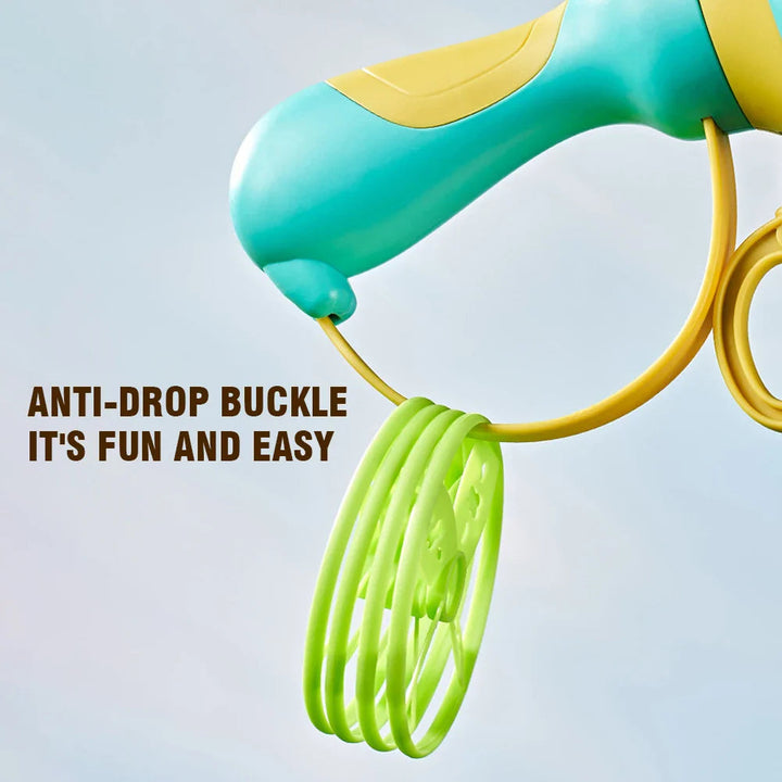 Green discs hanging from a hook at the base of the blue launcher handle