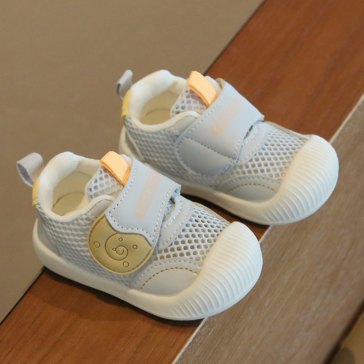 Blue mesh toddler sneakers with wide straps, bear details and white toe caps