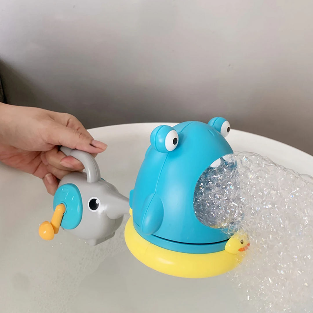 Blue monster bubble bath toy producing foam with an attached elephant-shaped blower