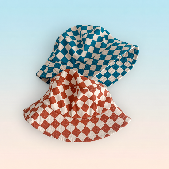 Blue and orange checkered bucket hats shown together