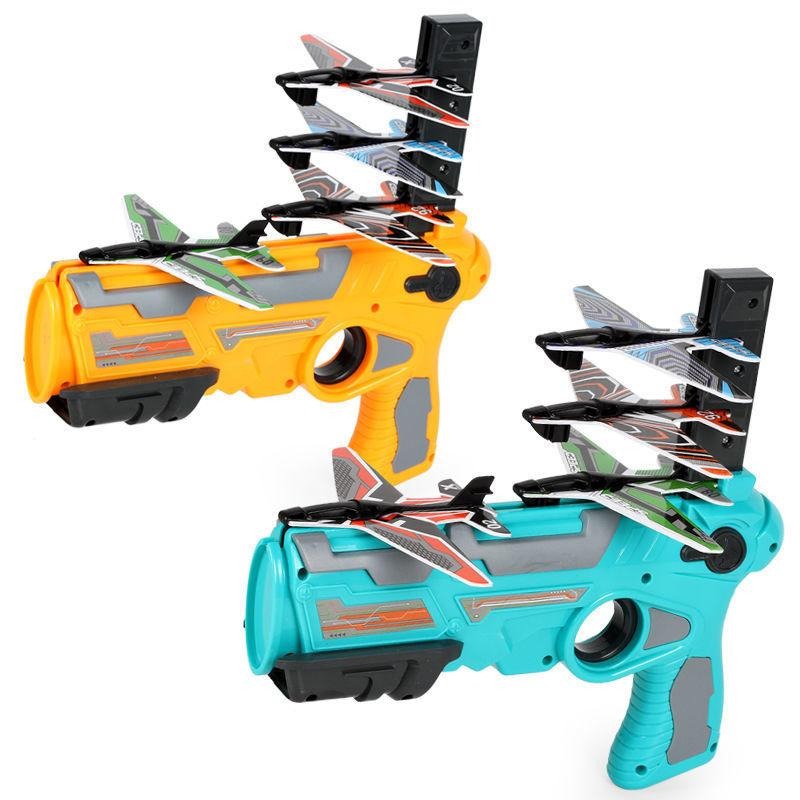 Blue and orange airplane launchers loaded with foam planes