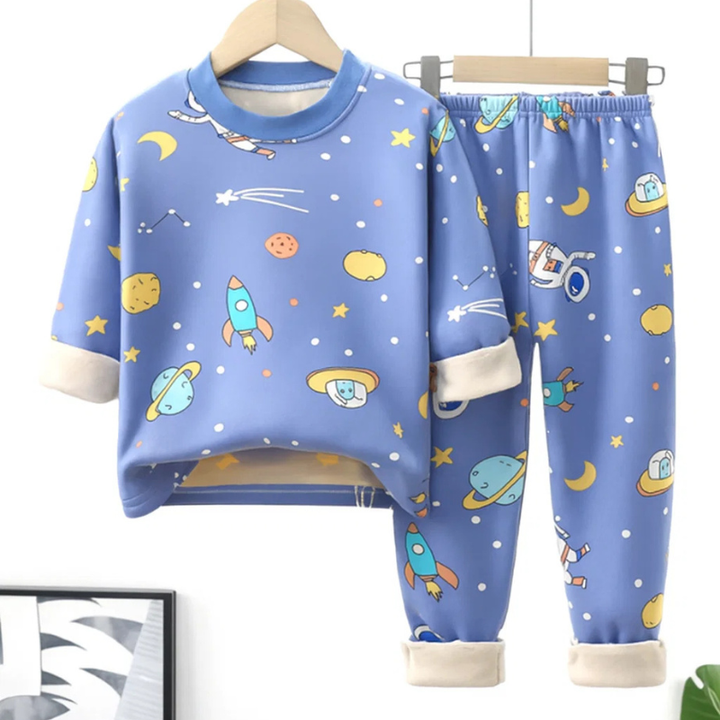 Blue space-print fleece pajama set with a long-sleeve top, matching pants, and cream cuffs
