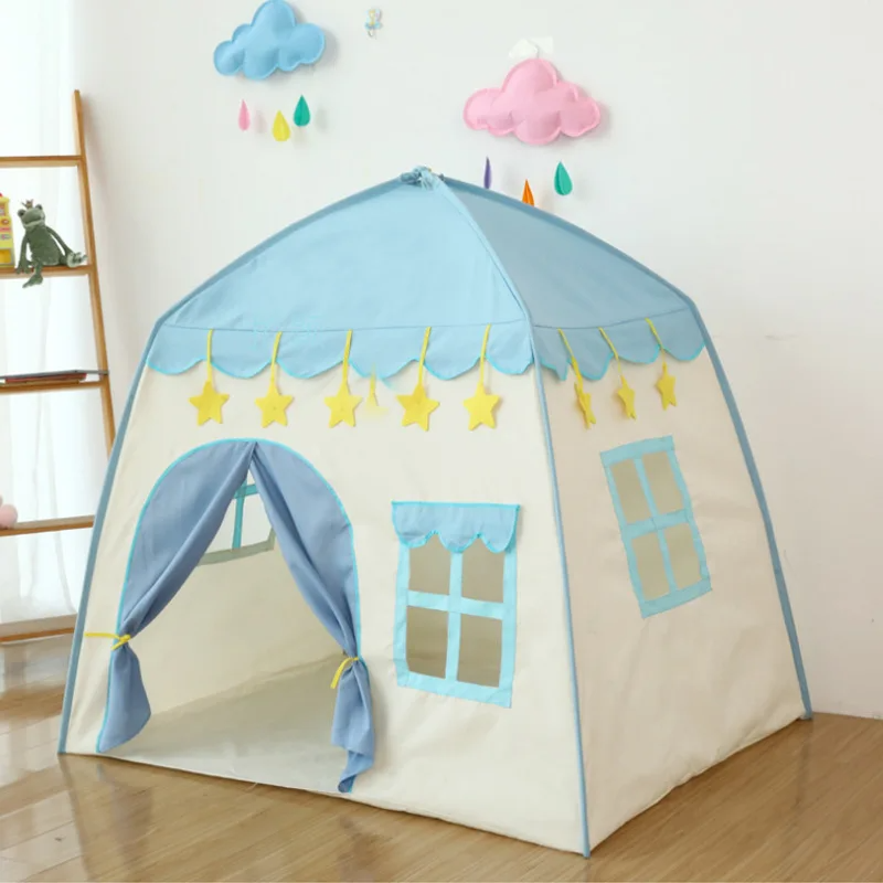 Blue castle play tent with star trim, side windows, and an open doorway